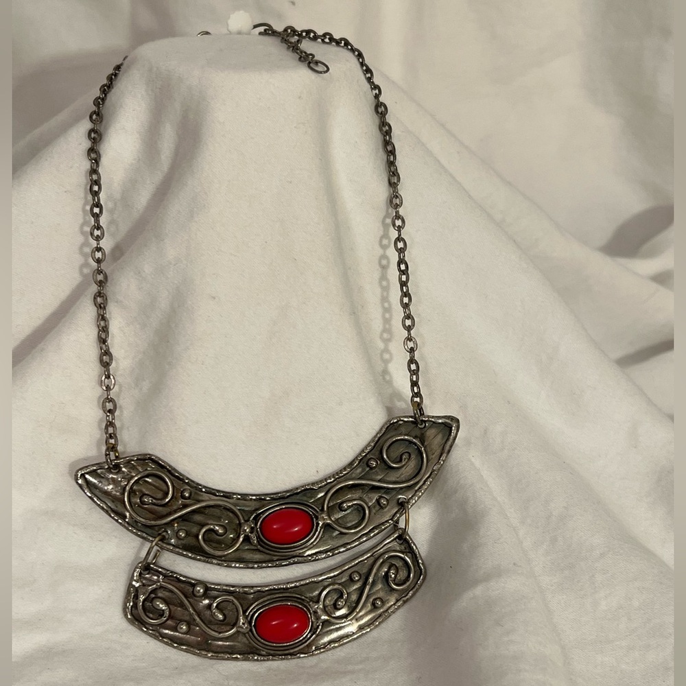 Large vintage silver necklace with red bead.